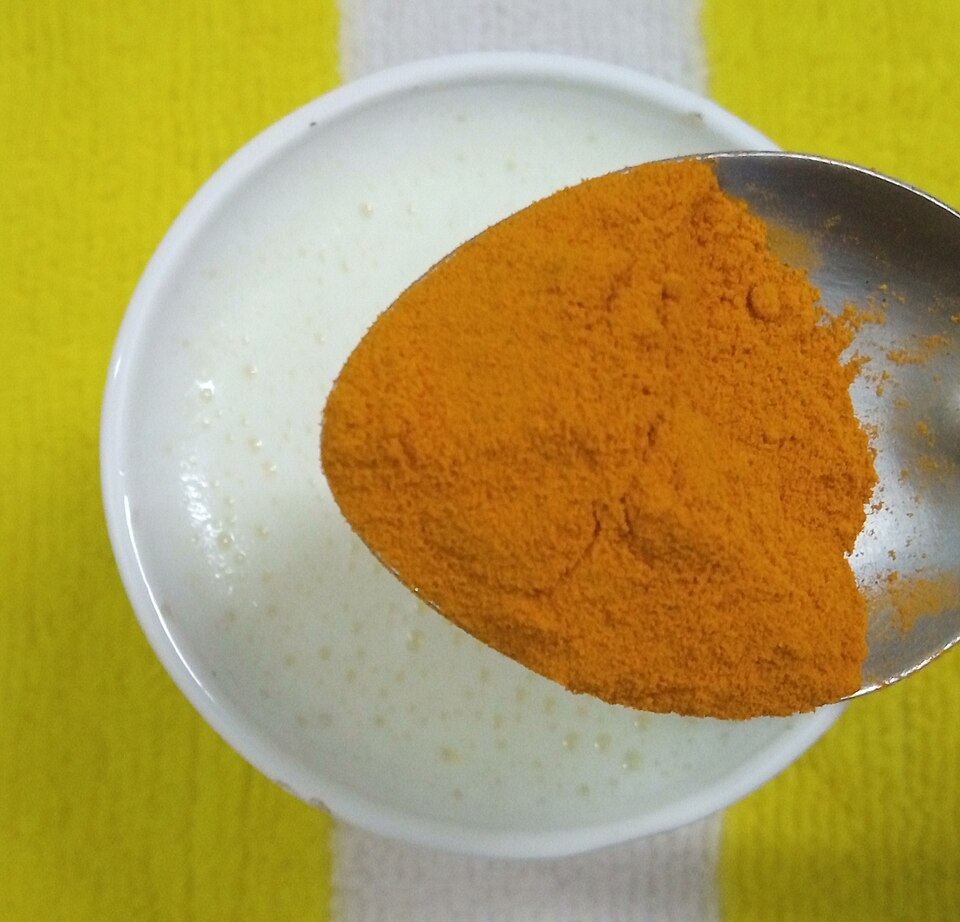 Glass of golden turmeric milk